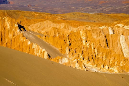 white snow covered mountain during daytime in San Pedro de Atacama Chile