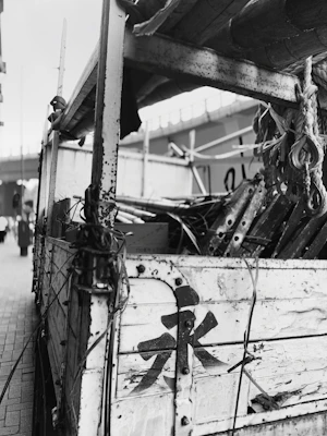 An industrial steel tool cart loaded with essential tools, ready to roll around the garage.