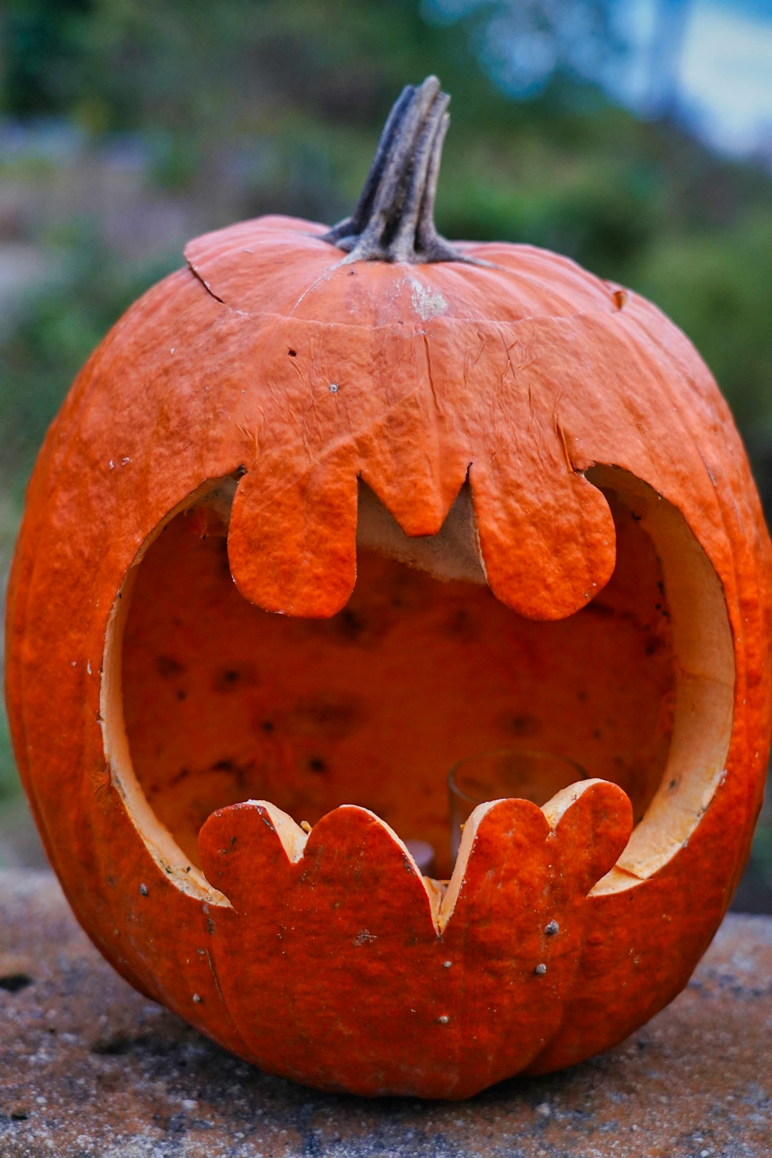 orange pumpkin with face carved