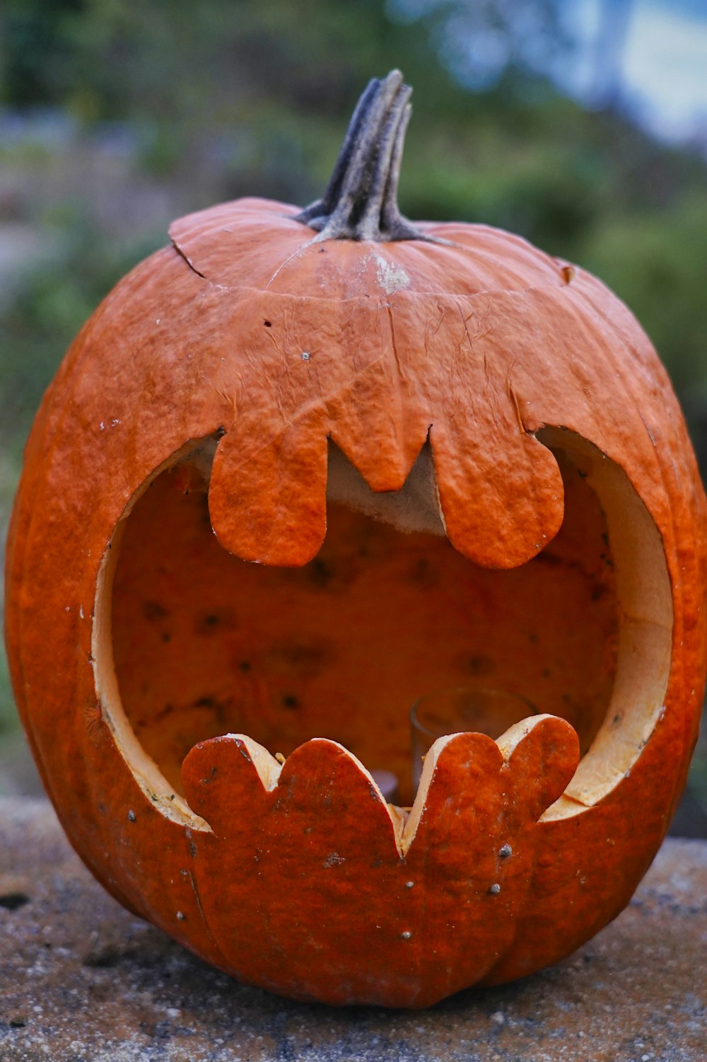 orange pumpkin with face carved