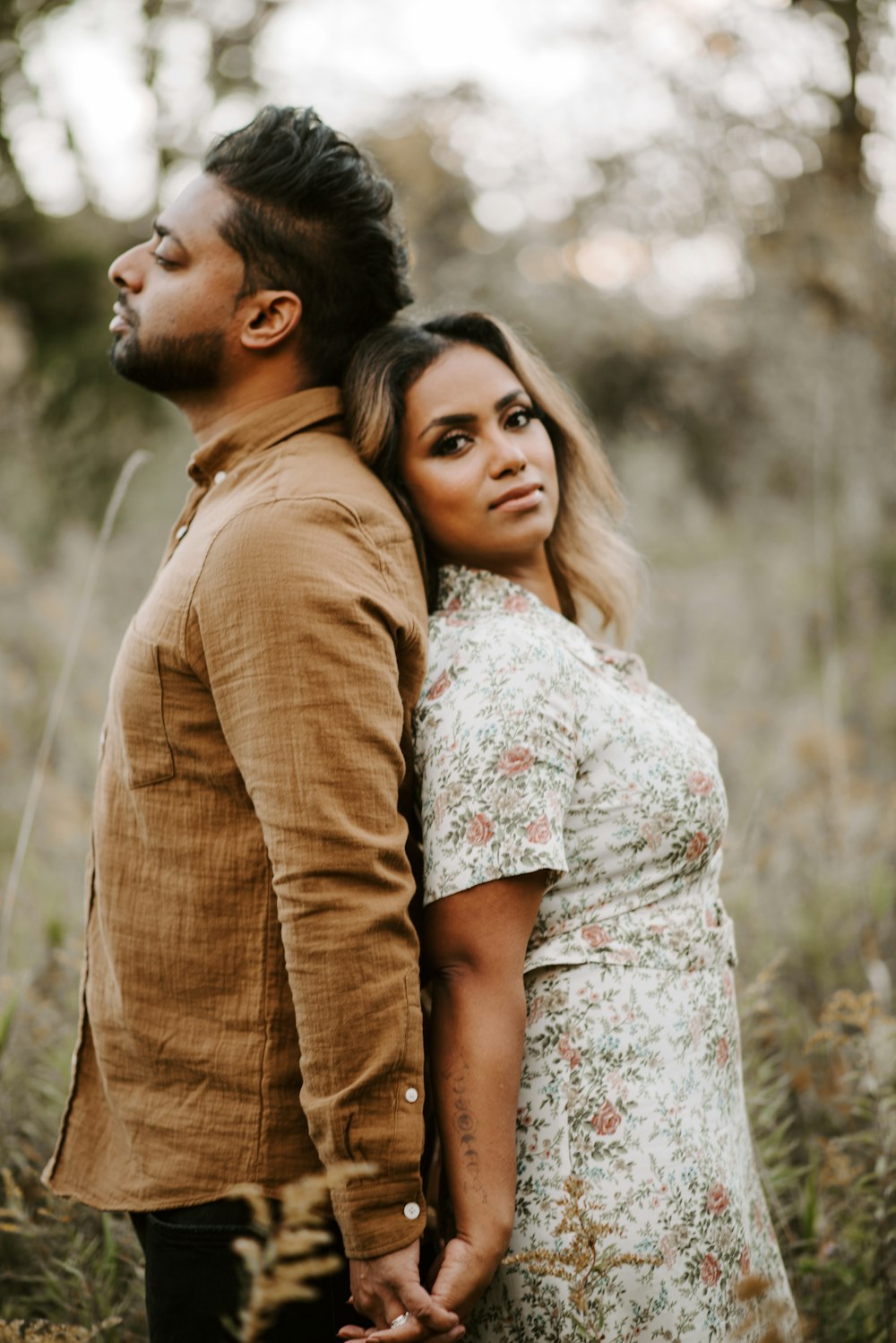 man and woman kissing during daytime