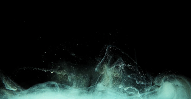 A serene dark purple and gold mystical background with subtle spiritual symbols.