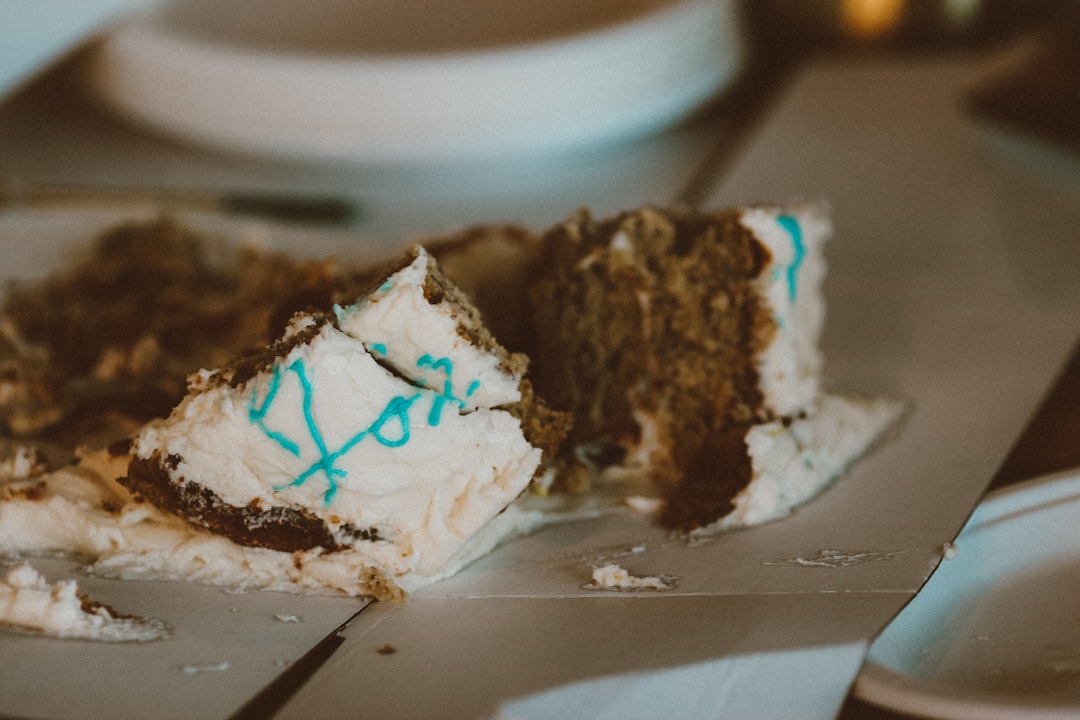 brown and white cake on white ceramic plate