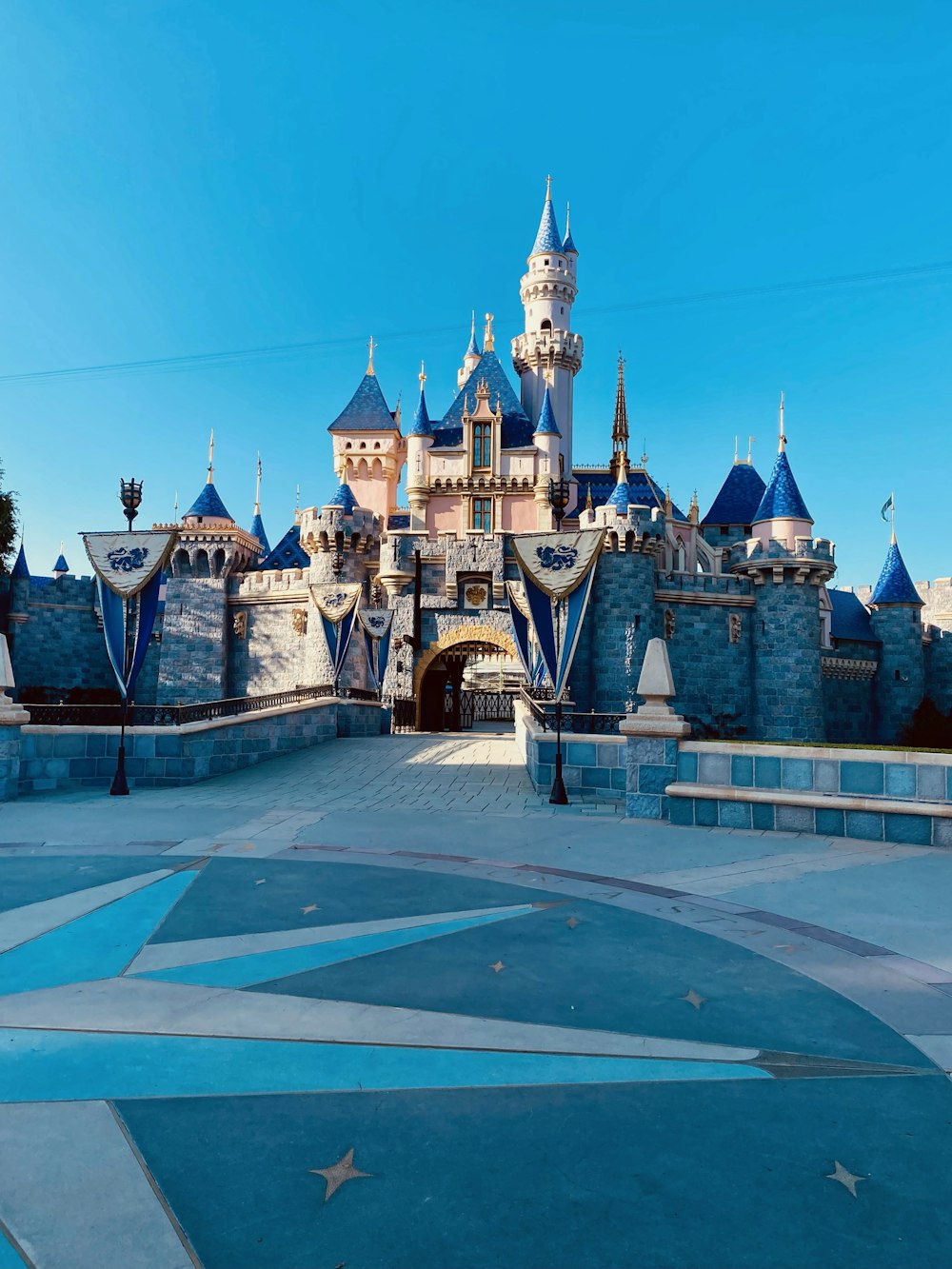 brown and white castle under blue sky during daytime