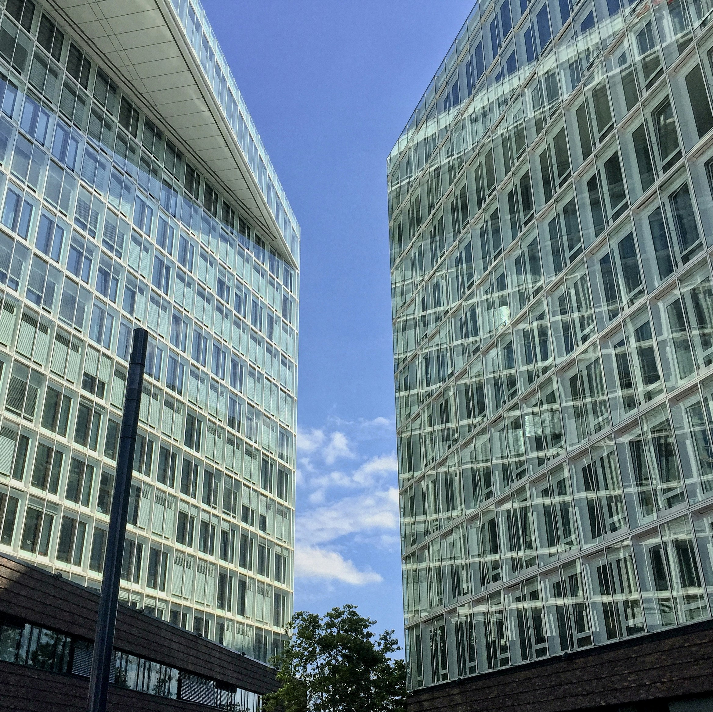 white concrete building under blue sky during daytime