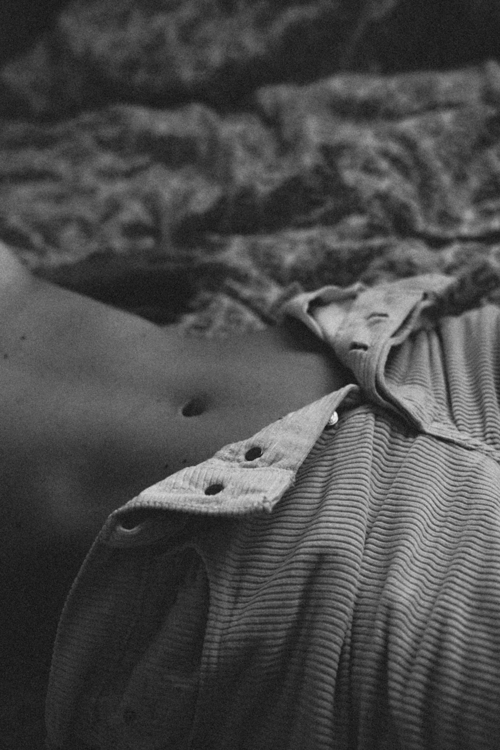 grayscale photo of person in button up shirt