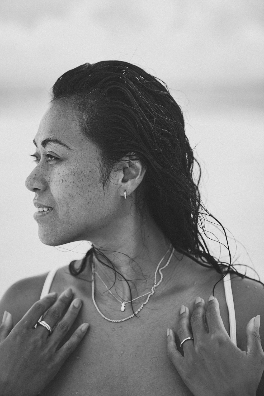 grayscale photo of woman in tank top