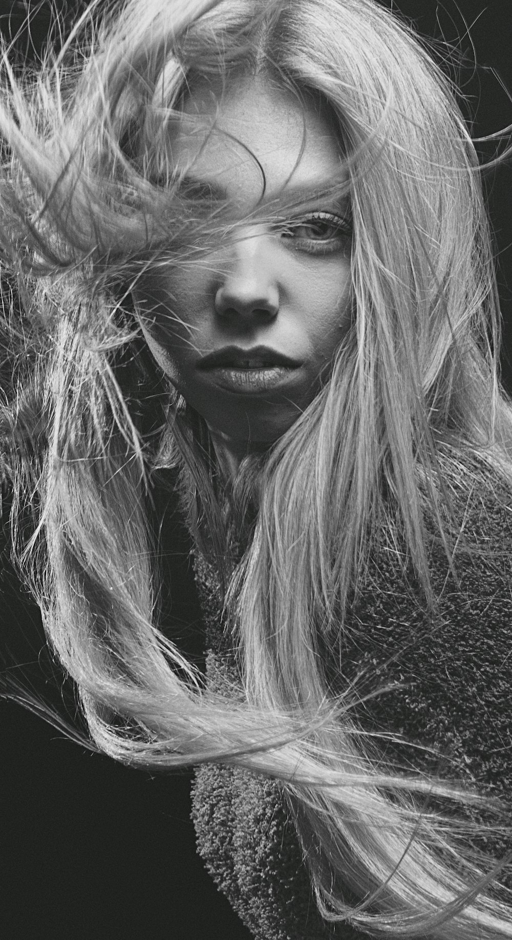 grayscale photo of woman with long hair