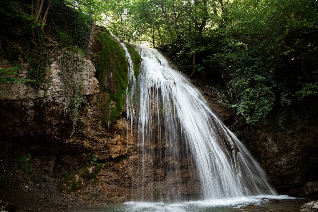 time lapse photography of waterfalls,