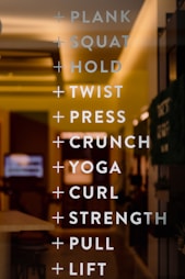 yellow and black wooden signage