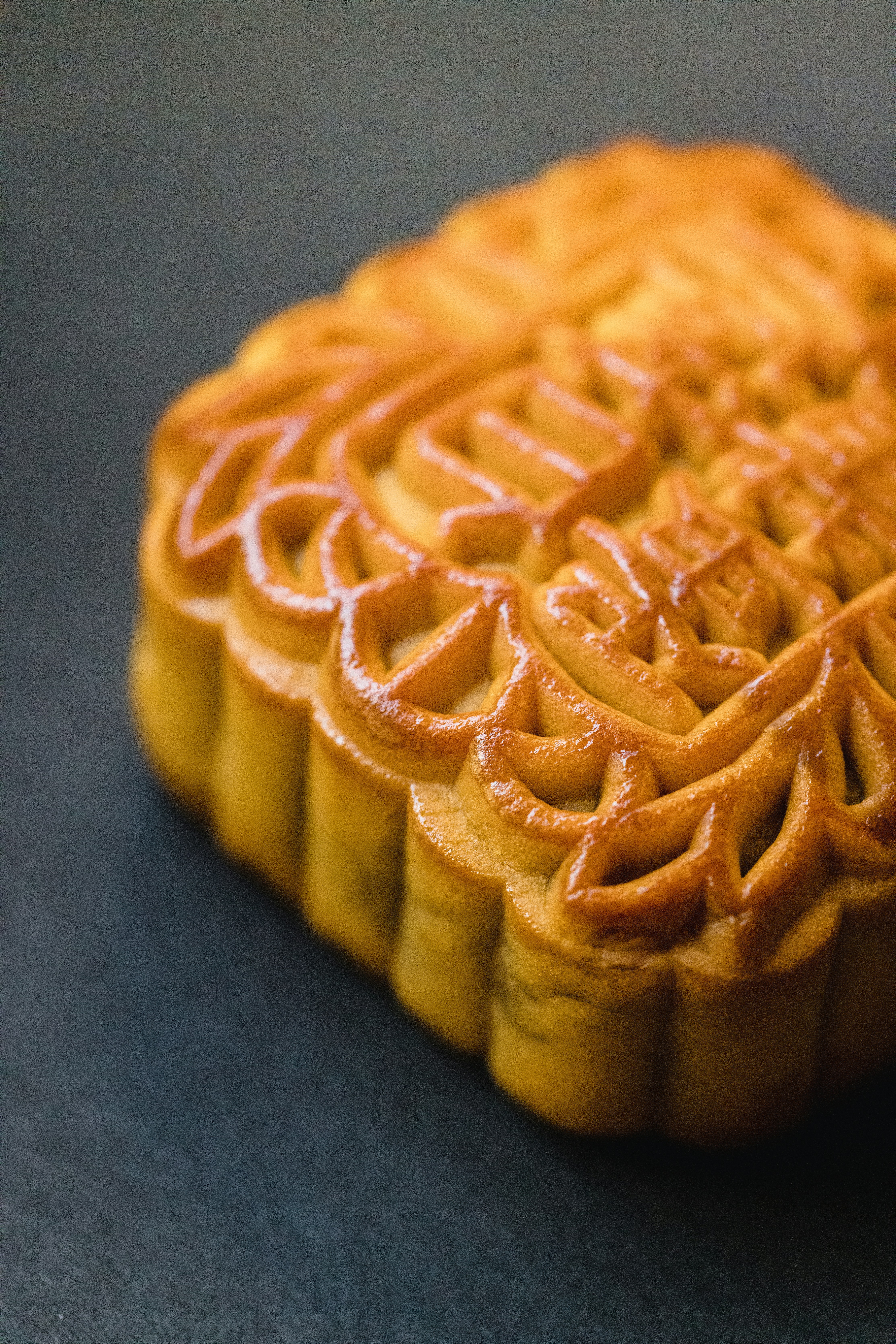 brown biscuits on black surface