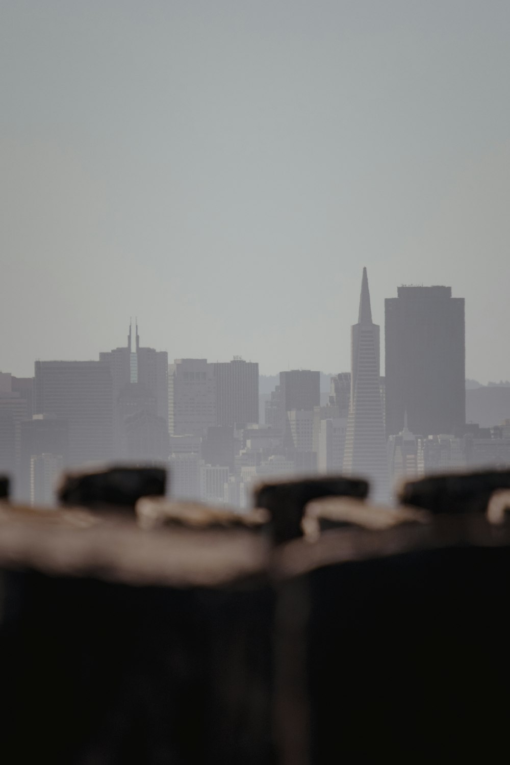 city skyline during foggy day