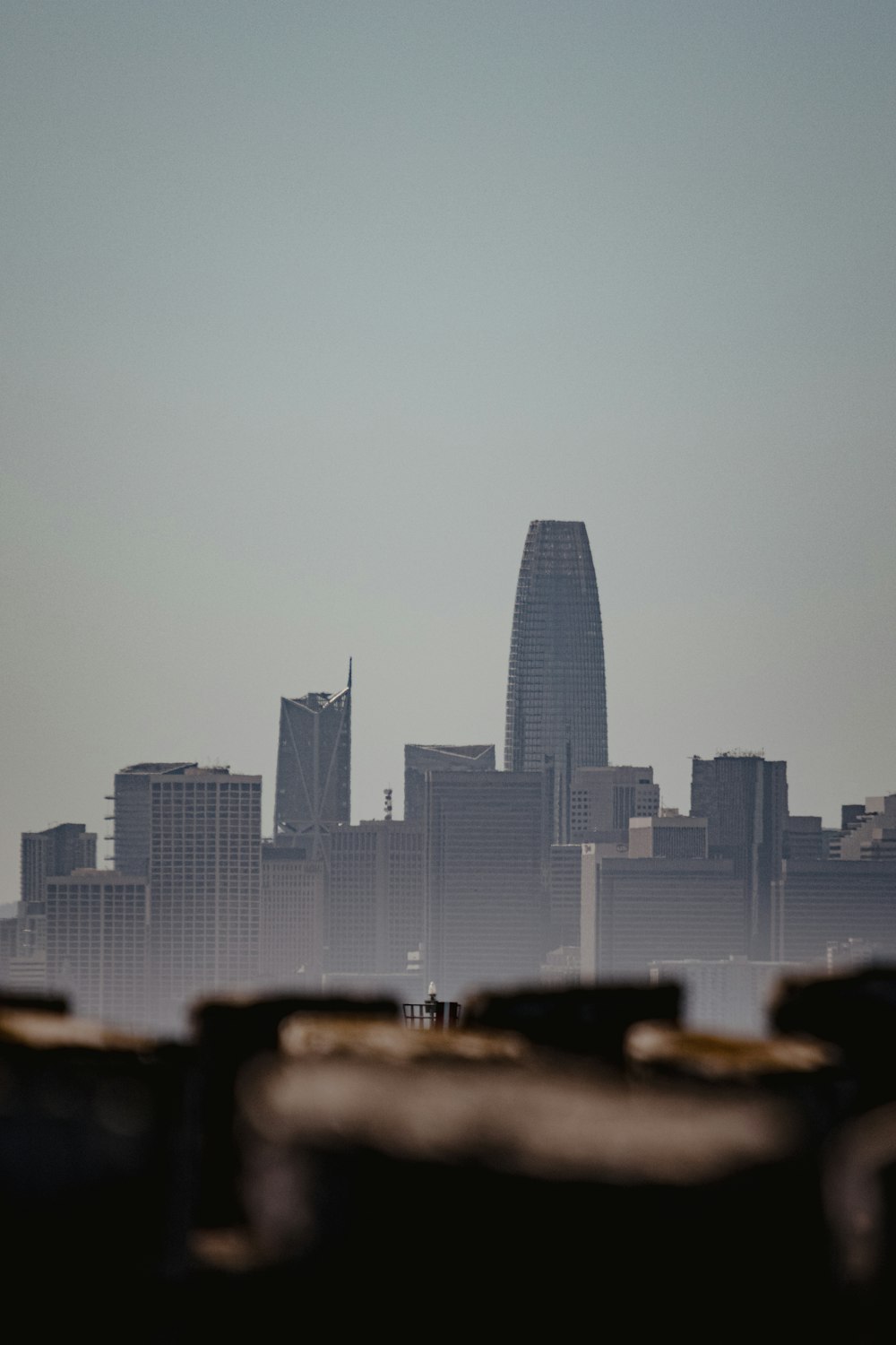 city skyline under gray sky during daytime