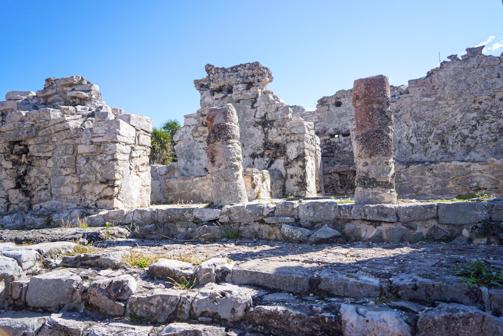 gray concrete ruins under blue sky during daytime