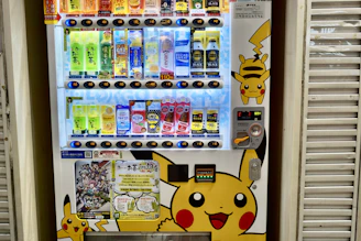 white and yellow vending machine