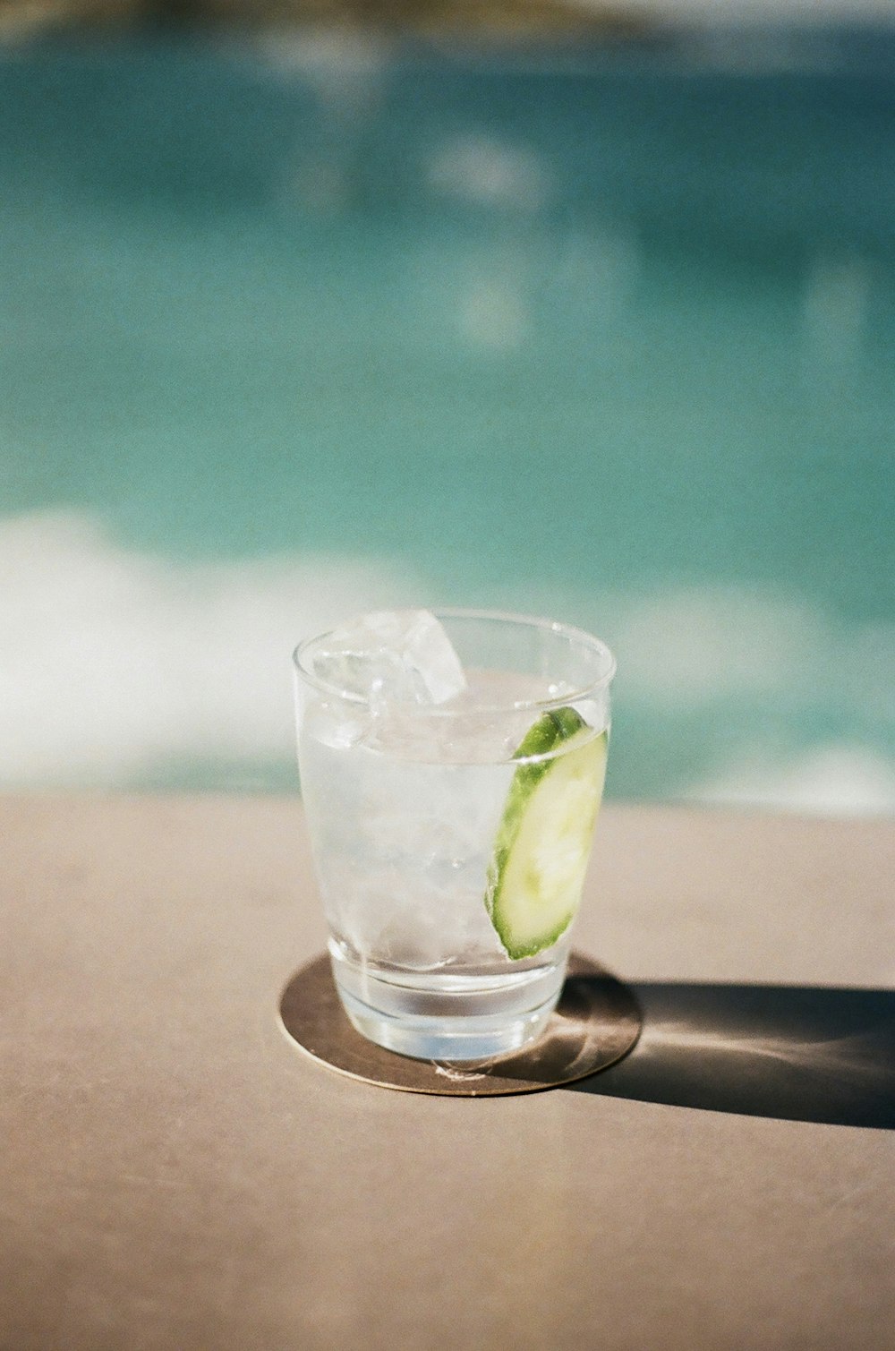 clear drinking glass with sliced lime