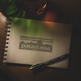 Illustration of Pasqui character sketching her story world, warm tones.