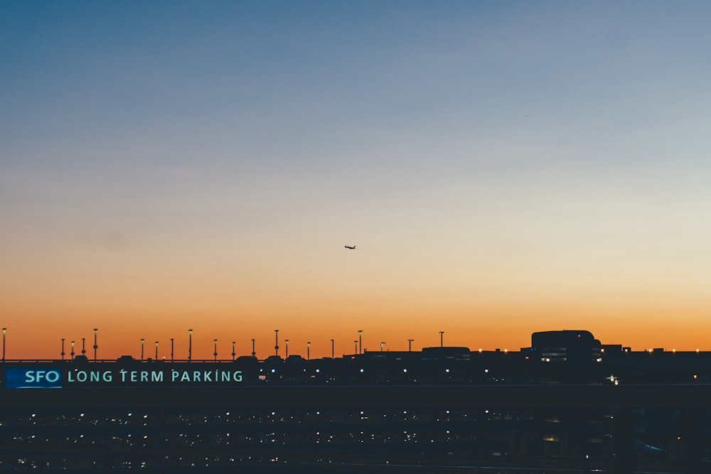 silhouette of city buildings during sunset