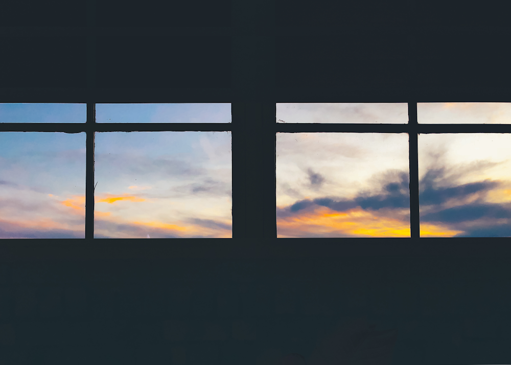 silhouette of window during sunset