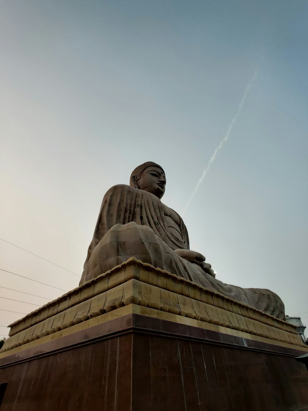 low angle photography of statue of man