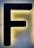 A large black letter 'F' is mounted on a textured, illuminated background that appears to be made of stone or stucco, creating a striking contrast with the surrounding light.