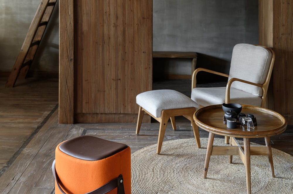 brown wooden round table near brown wooden wall