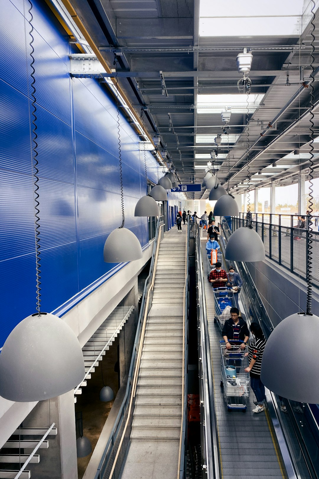 people walking on train station during daytime