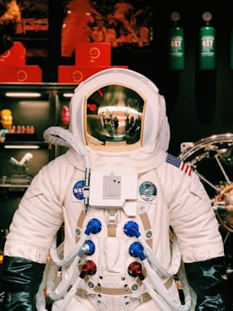 person in white and blue robot costume