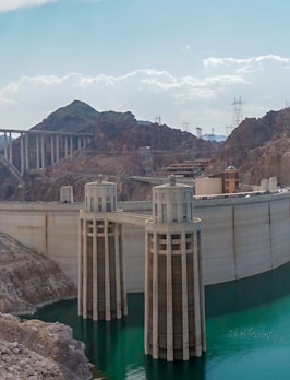 gray concrete bridge over the river