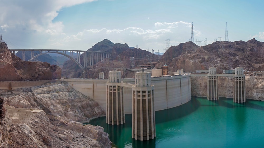 gray concrete bridge over the river