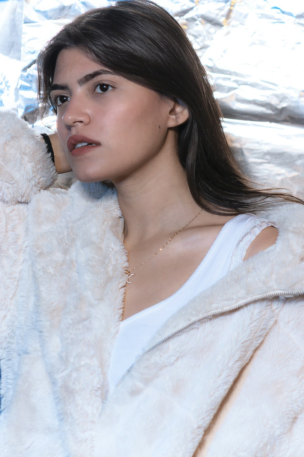 woman in white fur coat