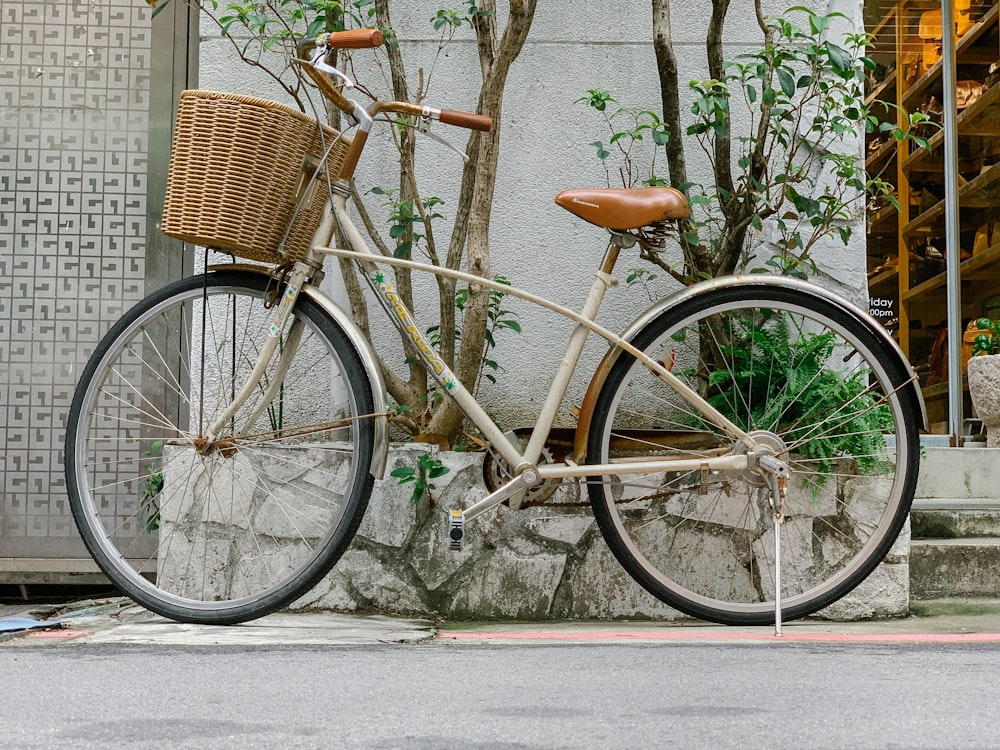 brown city bike on gray concrete road