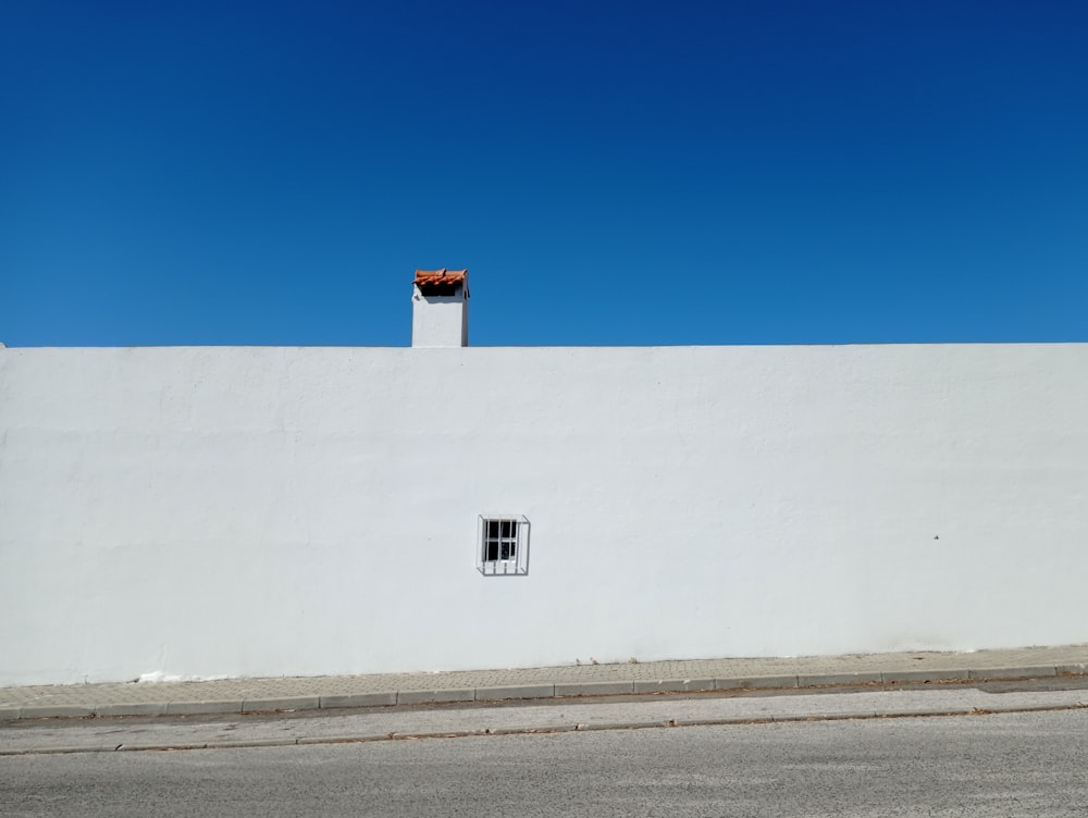 white concrete building under blue sky during daytime