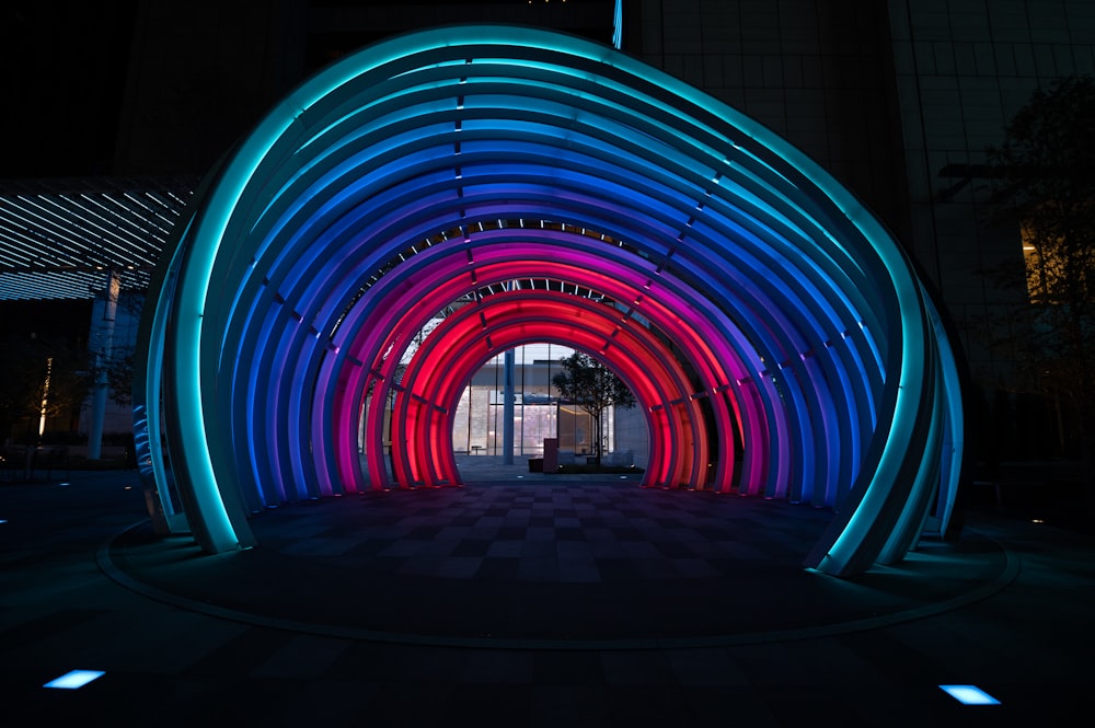 blue and red lighted tunnel