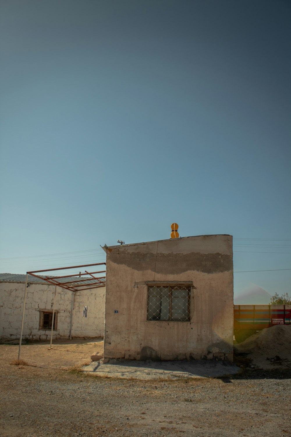 brown concrete building under blue sky during daytime