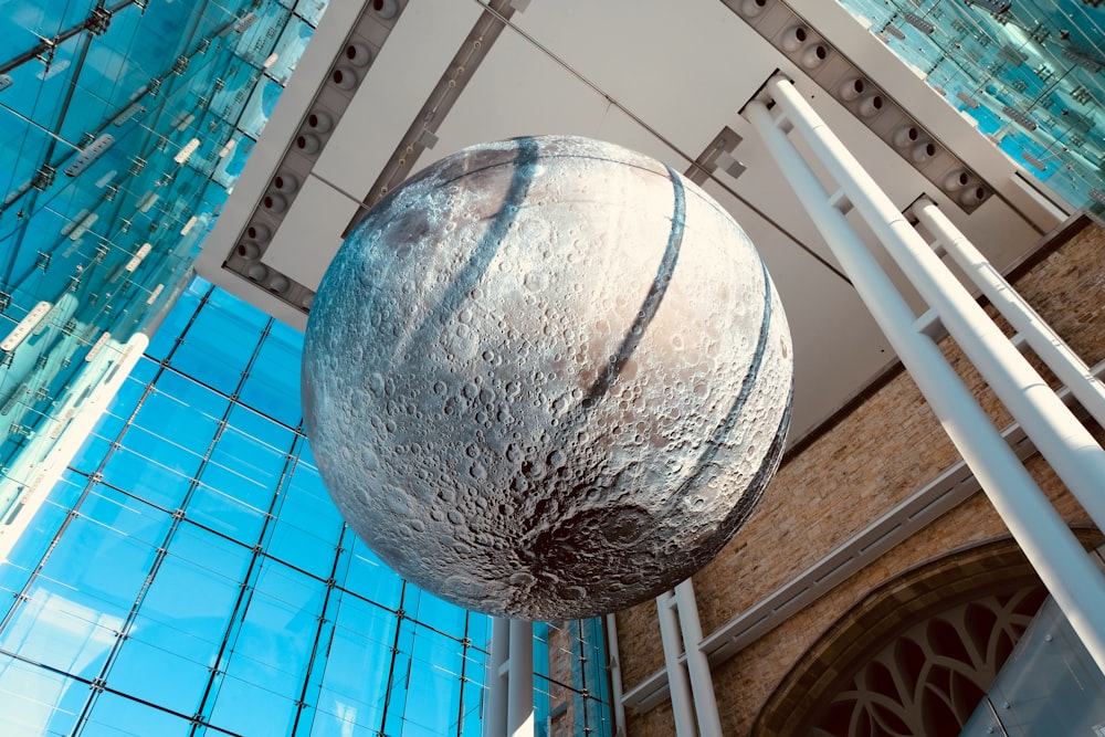 gray and white globe statue