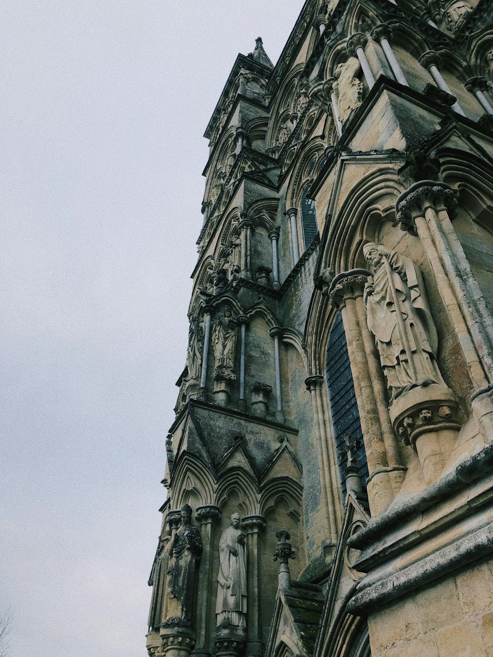 low angle photography of gray concrete building