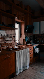 black flat screen tv on brown wooden tv rack