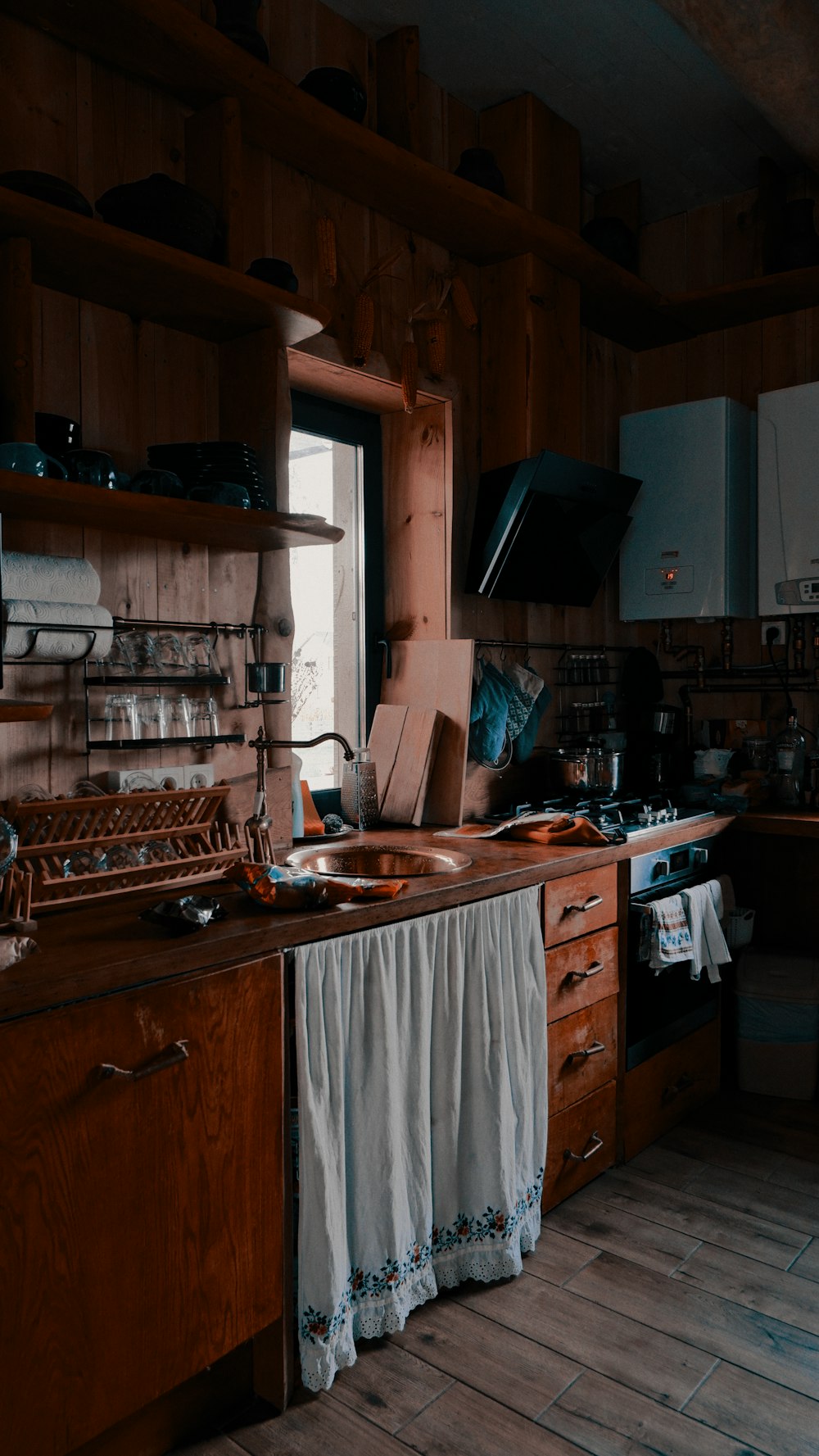 black flat screen tv on brown wooden tv rack