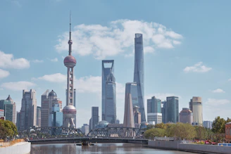 city skyline under blue sky during daytime