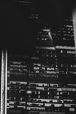 grayscale photo of city buildings