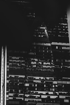 grayscale photo of city buildings