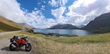 A detailed 3D rendering of a motorcycle parked in a scenic location.