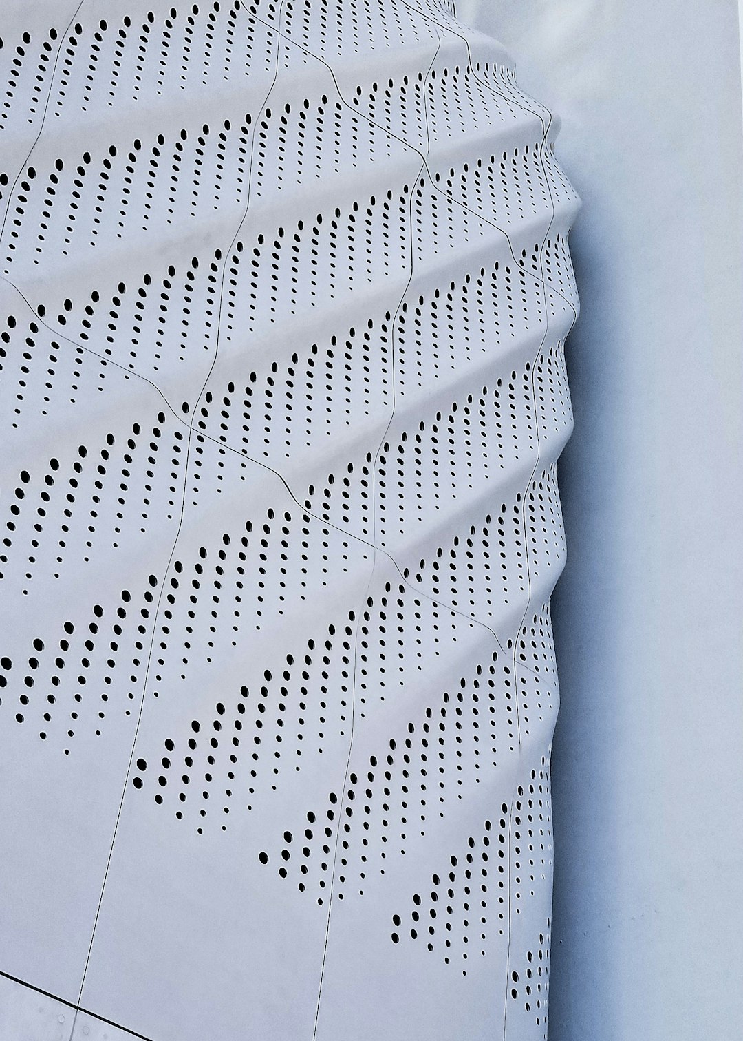 white braille paper on white table