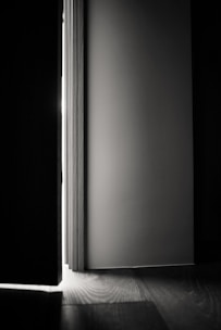 white wooden door with glass