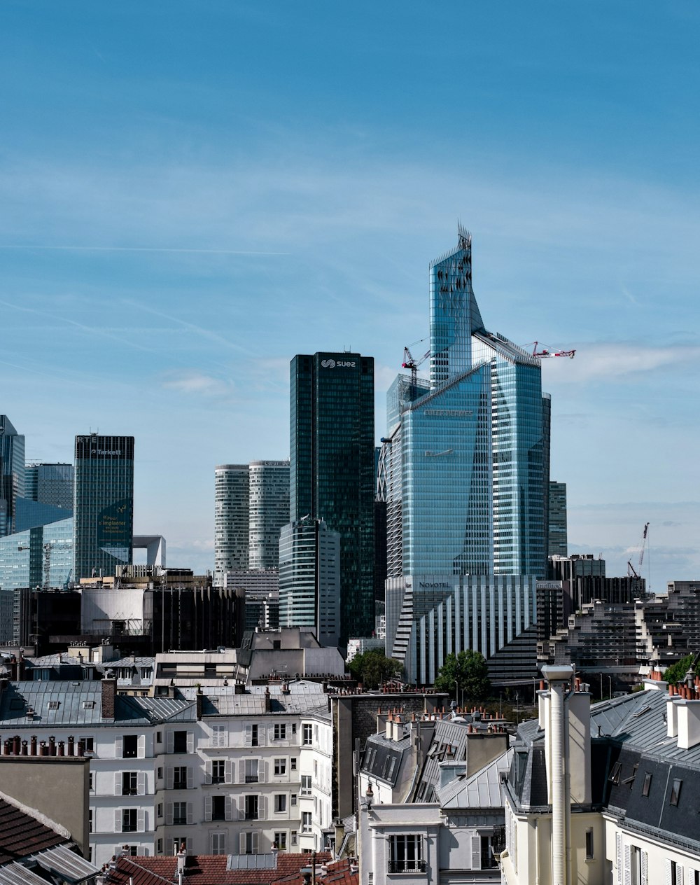 city buildings under blue sky during daytime