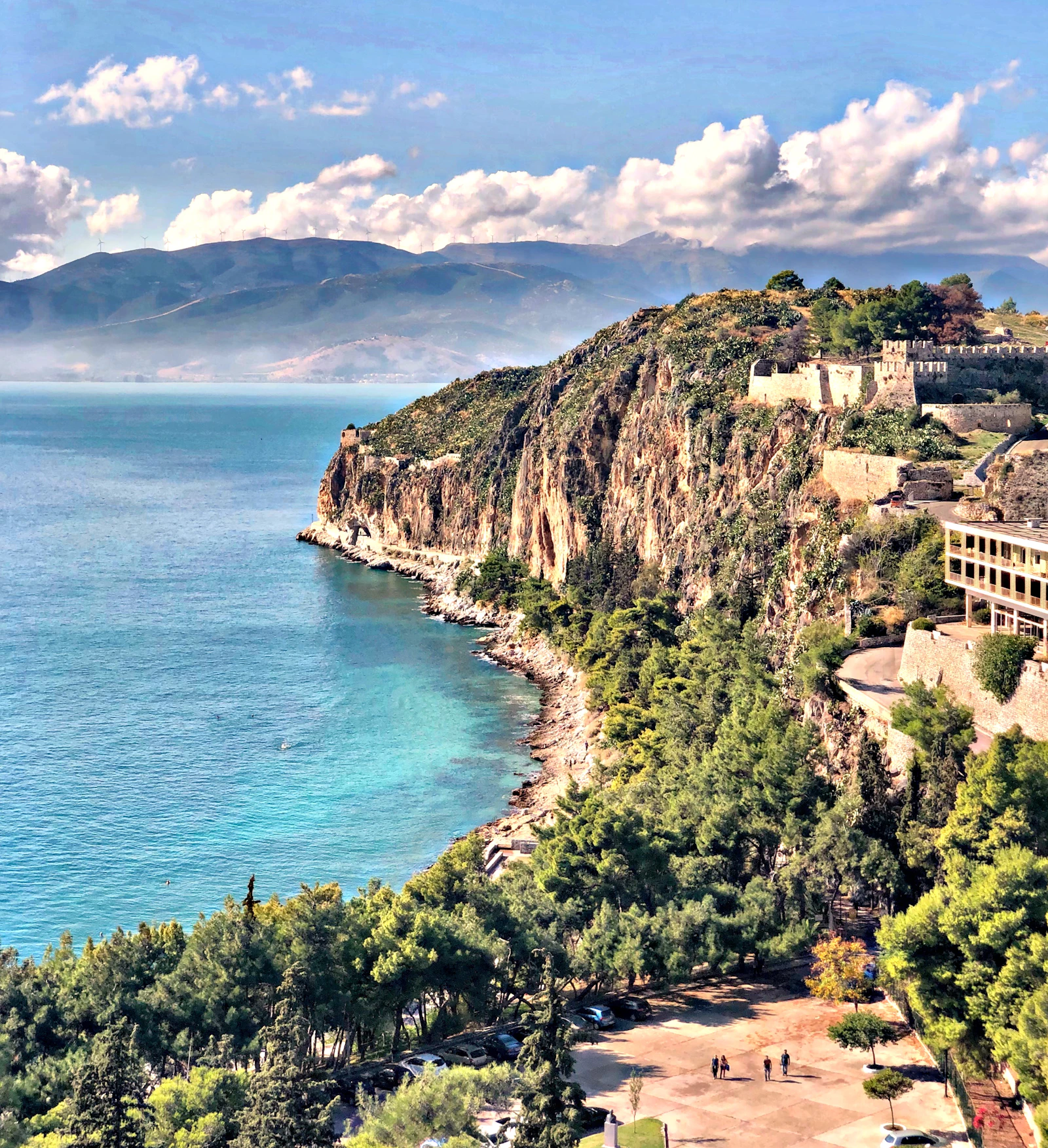 Nafplio waterfront and fortress above blue water