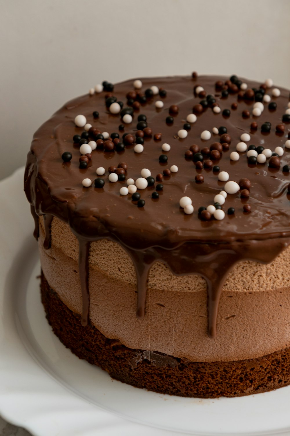 chocolate cake with white icing on top