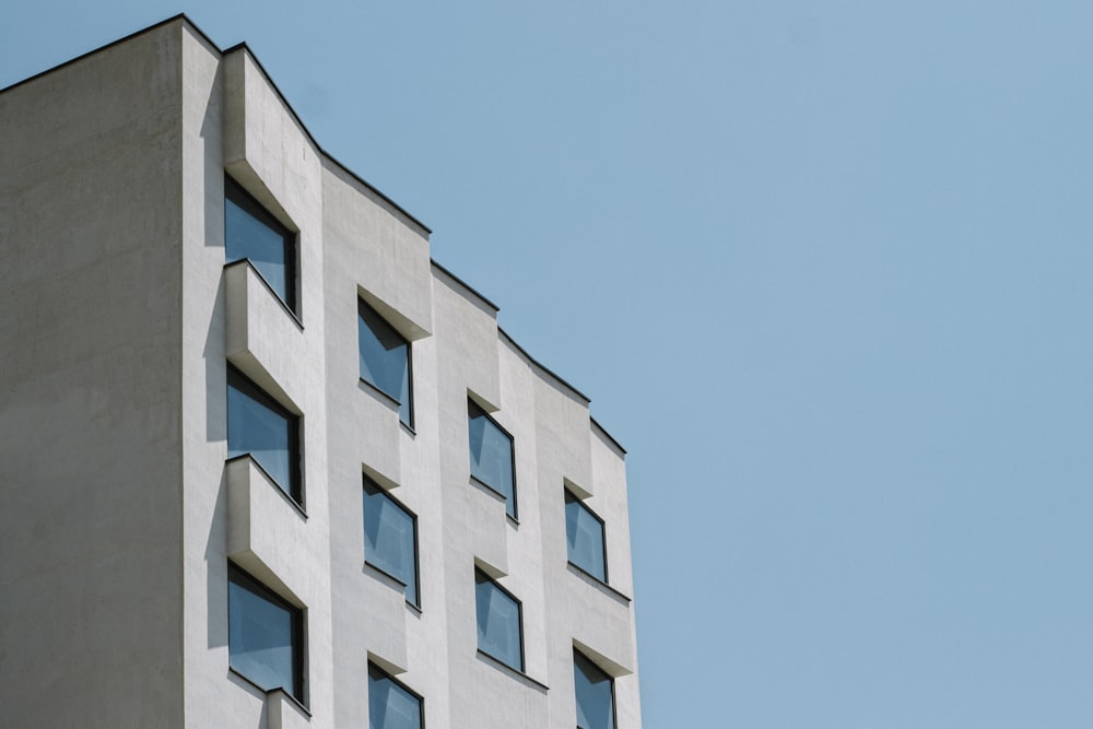 white concrete building under blue sky during daytime