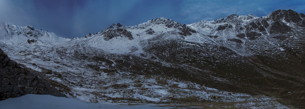 snow covered mountain under blue sky during daytime